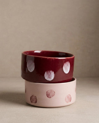Pop Dots stoneware pet bowls stacked, pink and burgundy, hand-painted dots